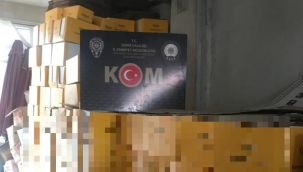 İZMİR'DE KAÇAK GÜNEŞ KREMİ DEPOSUNA BASKIN