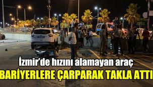İzmir’de hızını alamayan araç bariyerlere çarparak takla attı