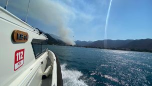 Orman yangını için uçak ve helikopterlerin su aldığı bölge deniz trafiğine kapatıldı