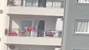 Apartmanın 10'uncu katında yaşayan kadın, balkondan atlamak istedi