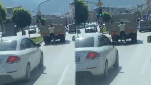 Kamyonetin arkasında patenle ölümüne yolculuk