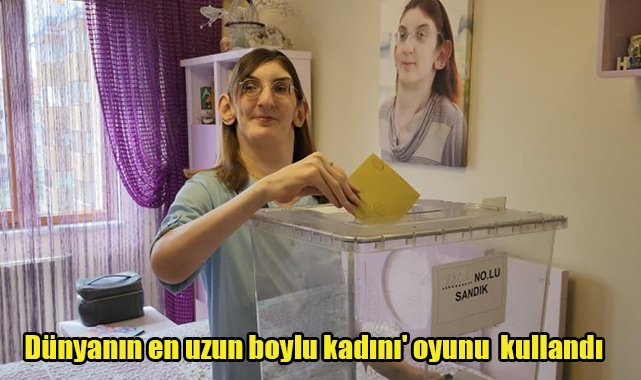Dünyanın en uzun boylu kadını oyunu evinde kullandı