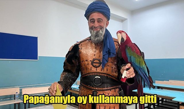 Papağanıyla oy kullanmaya gitti