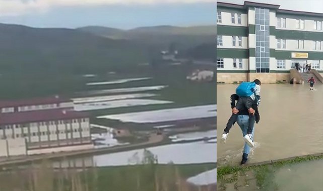 Okul bahçesi sular altında kaldı, öğrenciler birbirini sırtladı