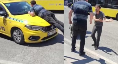 Pendik'te ilginç olay: Taksinin kaputuna çıkıp camı patlattı