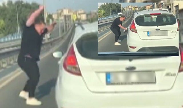 İzmir'de korku dolu anlar: Yol kesip sürücünün aynasını kırdı